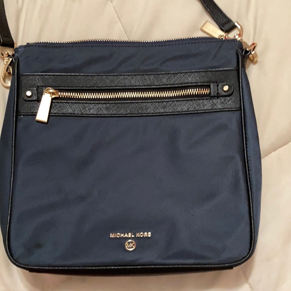 Michael Kors crossbody purse.